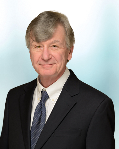 RAYMOND J. STINE